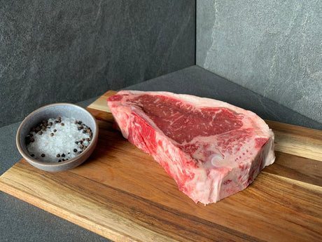 Platinum Bone In Porterhouse (Grain Fed)